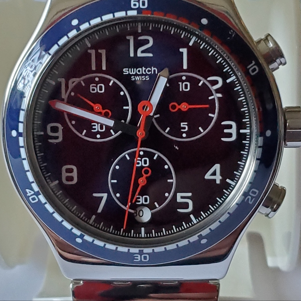 Beautiful SWATCH WATCH, silver band with red, white, and blue face